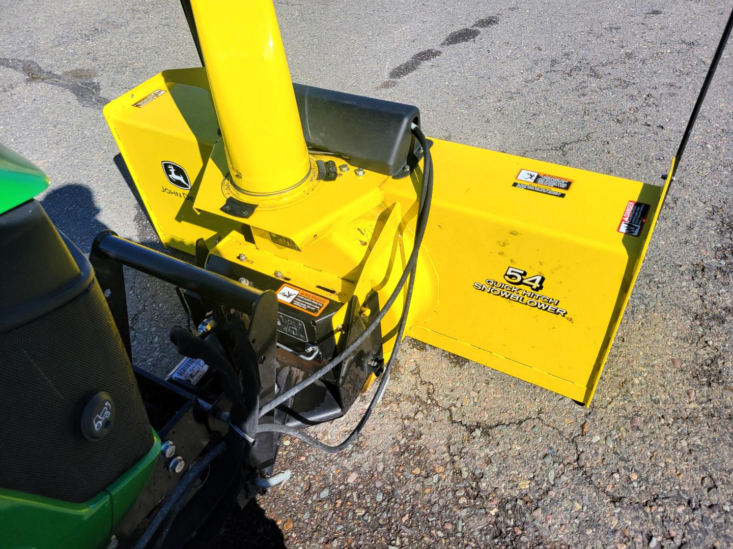 2018 Green /Yellow John Deere 1025R with an 3TNV80F-NCJT engine, Hydrostatic transmission, located at 450 N Russell, Missoula, MT, 59801, (406) 543-6600, 46.874496, -114.017433 - Only 106 Hours. Really Nice 2018 John Deere 4Wheel Drive 1025R Diesel Tractor. 25HP. Comes with John Deere 54" Front Snow Blower. Has Owners Manuals for the Tractor and the Blower. Lots of Specs one the pictures page. Excellent Condition. Plastic has never been off the seat. Does Not come with any o - Photo#11